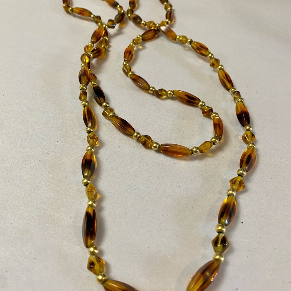 Brown and Gold Beaded Necklace with Elongated Design